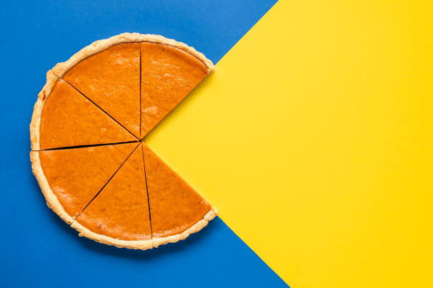 pumpkin pie home-baked, above view. sliced pie isolated on a colorful background - serving a slice of cake imagens e fotografias de stock