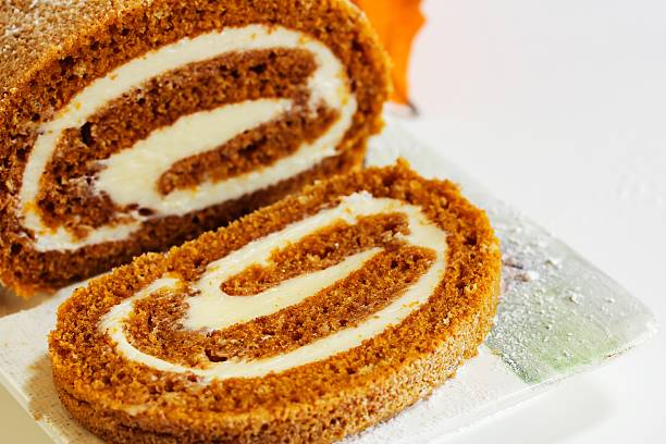 Pumpkin Roll with white icing stock photo