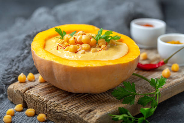 Pumpkin soup with chickpeas and spices. stock photo