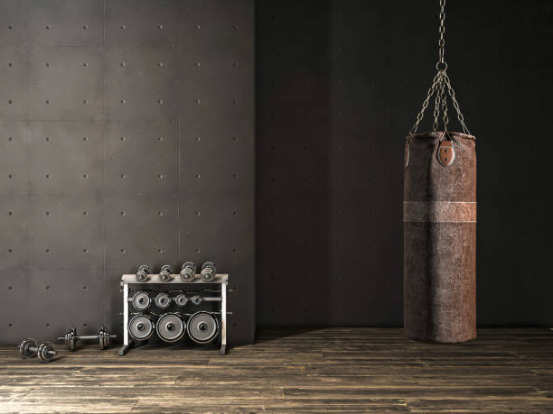 punching bag and dumbbells in gym 3d illustration stock photo