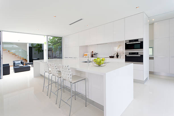 A pure white dream kitchen that is totally spotless  stock photo