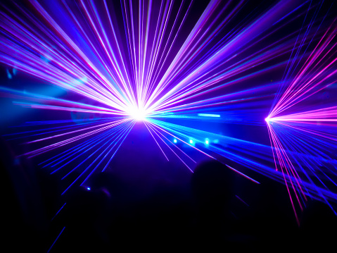 Purple and blue lasers in a club