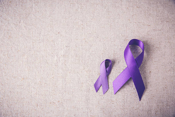 Purple ribbons toning copy space background, Alzheimer's disease Purple ribbons toning copy space background, Alzheimer's disease, Pancreatic cancer, Epilepsy awareness, Hodgkin's Lymphoma awareness domestic violence stock pictures, royalty-free photos & images