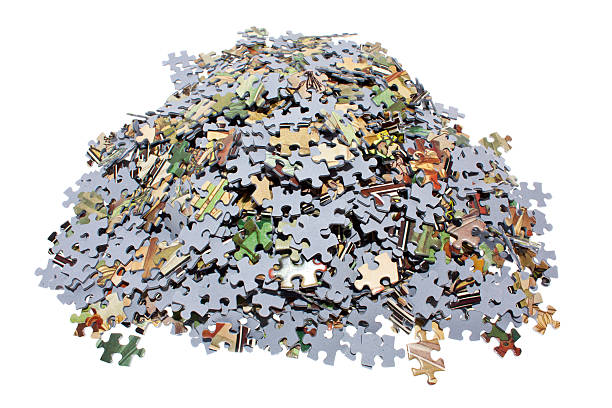 puzzle pieces, cut out on white background stock photo