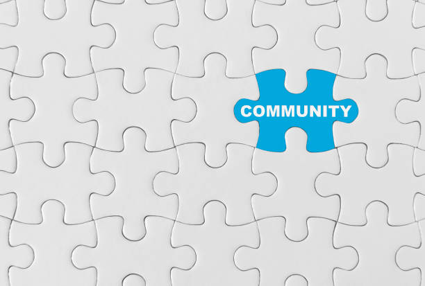 Puzzle pieces with word ‘Community’ stock photo