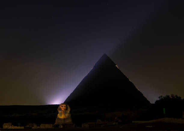 Pyramids of Giza by night stock photo