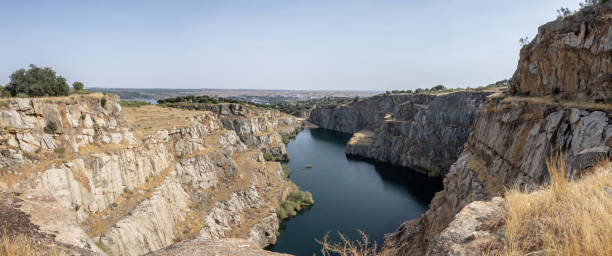 quarry open at AlcÃ¡ntara (Spain) with a small beach for swimming stock photo