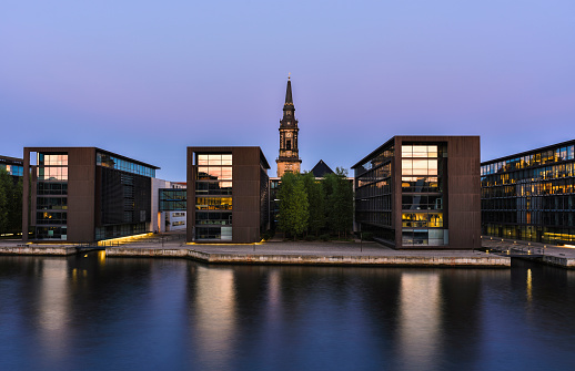 Mixing modern and ancient architecture. Quay of Copenhagen of business area.