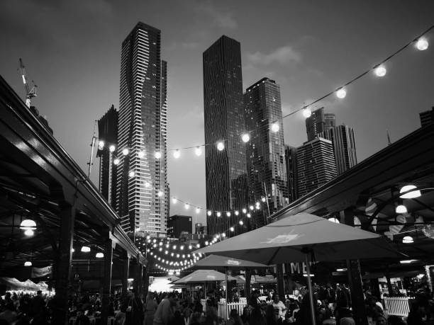 Queen Victoria Market - Melbourne Melbourne, Australia: March 06, 2019: Melbourne's famous Summer Night Market selling only ethnic food and drink - every Wednesday at Victoria Market. Melbourne Cityscape background. queen victoria market stock pictures, royalty-free photos & images