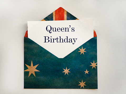 Queen's Birthday. Beautiful, bright card. Closeup, view from above
