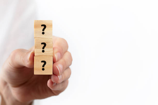 question mark icon on wooden cubes. Problem and solution concept. stock photo