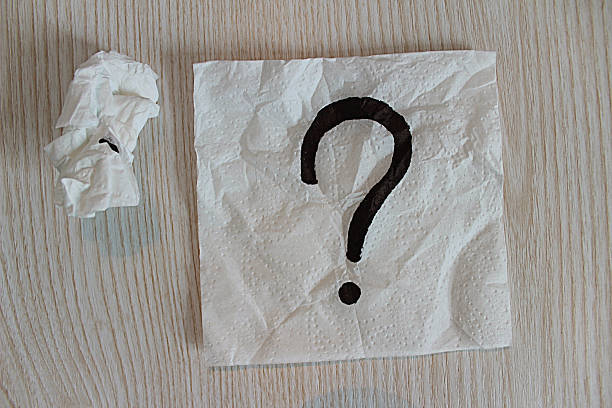 Question mark on a paper napkin stock photo