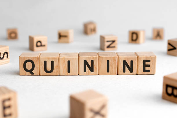 Quinine - words from wooden blocks with letters Quinine - words from wooden blocks with letters, quinine concept, white background quinine stock pictures, royalty-free photos & images