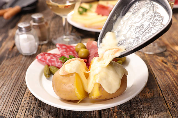 raclette cheese melted stock photo