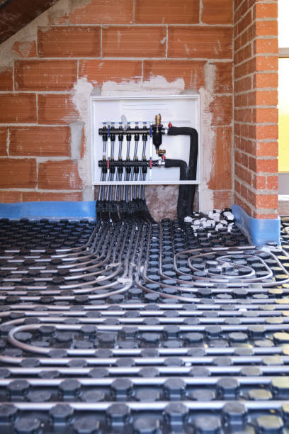 Radiant floor heating hydronic manifold with flexible tubing. stock photo