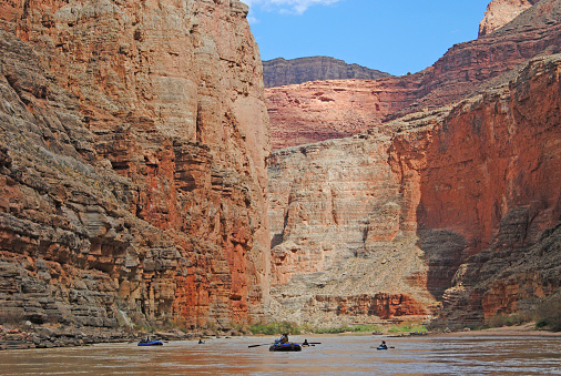 Rafters and kayakers on the Colorado River as it flows through the Grand Canyon in Arizona.
