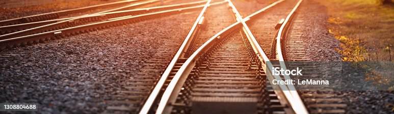 istock Railway track in the evening in sunset 1308804688