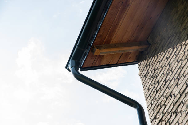 Rain gutter on the roof of the house. stock photo