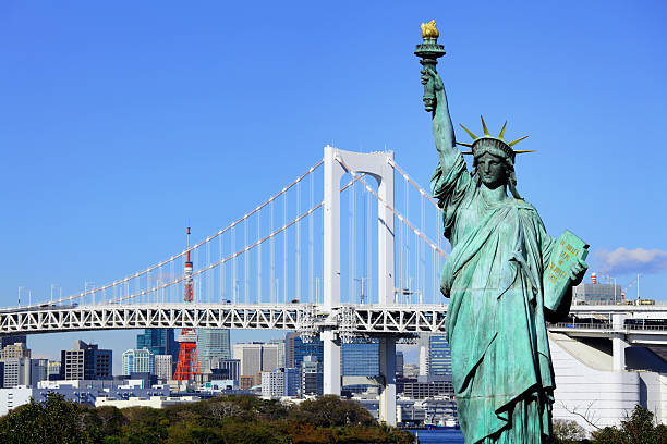 Rainbow Bridge, statue of Liberty, and Tokyo Tower stock photo