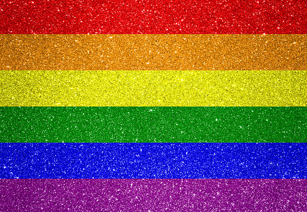 Rainbow colored stripy flag of LGBT stock photo
