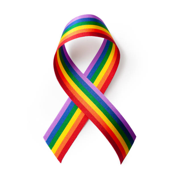 Rainbow LGBT ribbon, symbol of supporting the LGBT pride community. Rainbow LGBT ribbon isolated on a white background. gay pride symbol stock pictures, royalty-free photos & images