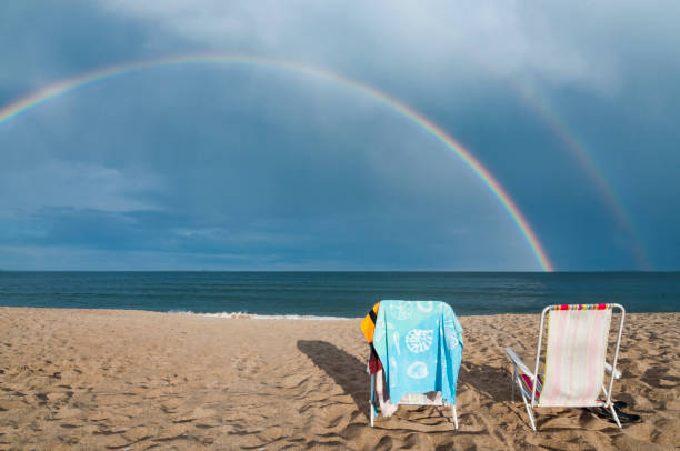 Rainbow on the beach stock photo