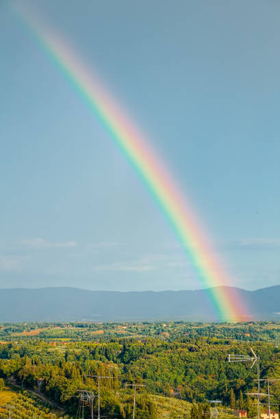 Rainbow on the medieval village of San Gimignano, Tuscany stock photo