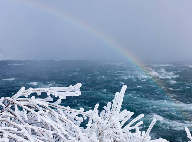 Rainbow over Niagara River stock photo