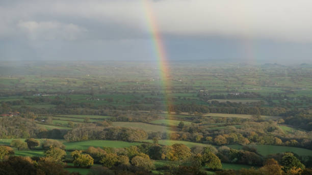 Rainbow over the English Countryside stock photo