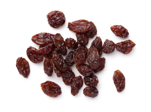 Raisin Isolated Over White Background Raisin isolated over white background. Flat lay. Top view dried food photos stock pictures, royalty-free photos & images