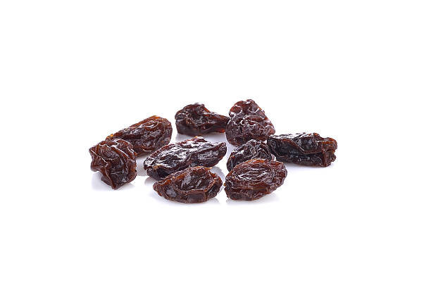 raisins  on white background stock photo