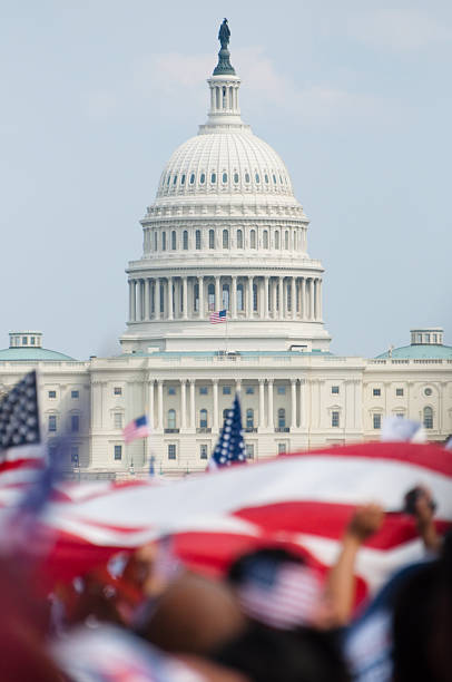 A rally taking place in front of the U.S. Capitol building stock photo