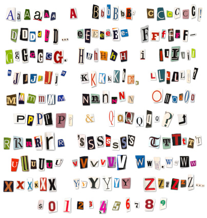 colorful alphabet of letters and numbers cut from magazines and newspapers arranged to look like a threatening letter.