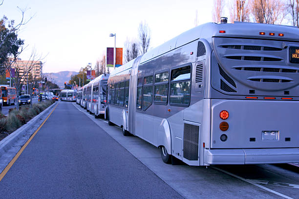 ラピッドトランジットのバスのアコーディオンバス優美 bendy - 連節バス 写真 ストックフォトと画像