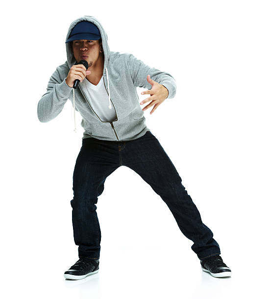 Rapper singing with microphone Rapper singing with microphonehttp://www.twodozendesign.info/i/1.png rapper stock pictures, royalty-free photos & images