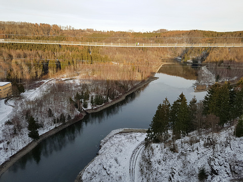 Rappode Dam with suspension bridge also known as Titan RT with dam and the river Bode in winter time