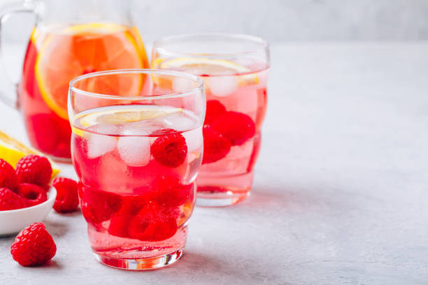 Raspberry lemon iced cold drink. stock photo
