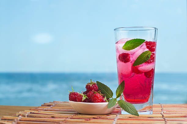 Raspberry lemonade with mint and ice. stock photo