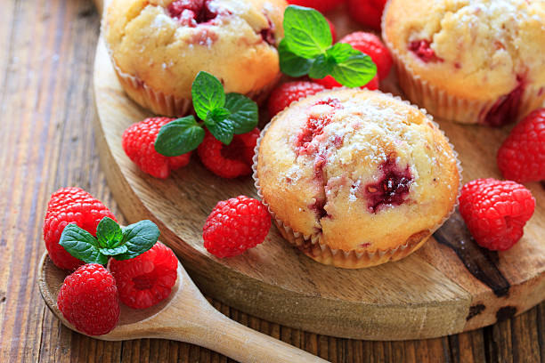 raspberry muffins stock photo