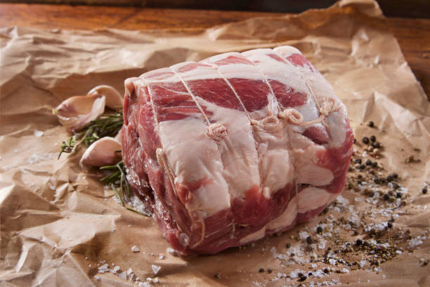 Raw Boneless Pork Shoulder Roast stock photo