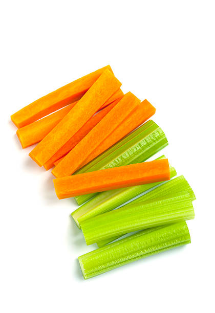 raw carrot and celery sticks raw carrot and celery sticks on white background celery stock pictures, royalty-free photos & images