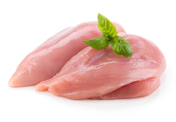 raw chicken fillets close up isolated on white - kip vlees stockfoto's en -beelden