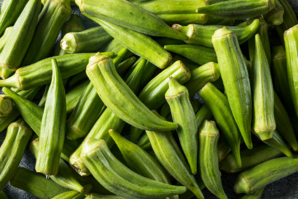 Raw Green Organic Okra Vegetables Raw Green Organic Okra Vegetables Ready to Cook okra photos stock pictures, royalty-free photos & images