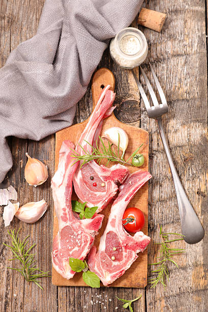 raw lamb chop with rosemary raw lamb chop with rosemary mutton chops stock pictures, royalty-free photos & images