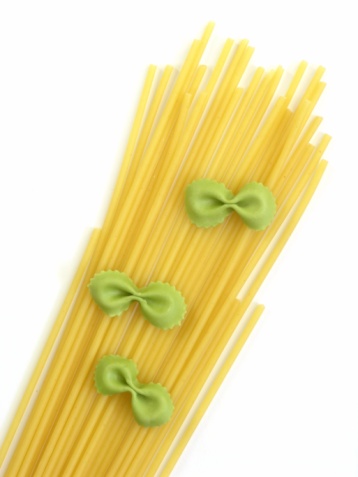 Dry italian tagliatelle noodles pasta on kitchen countertop