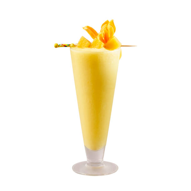 Raw mango smoothie, isolated on white background, with clipping path Raw mango smoothie, isolated on white background, with clipping path mango smoothie stock pictures, royalty-free photos & images