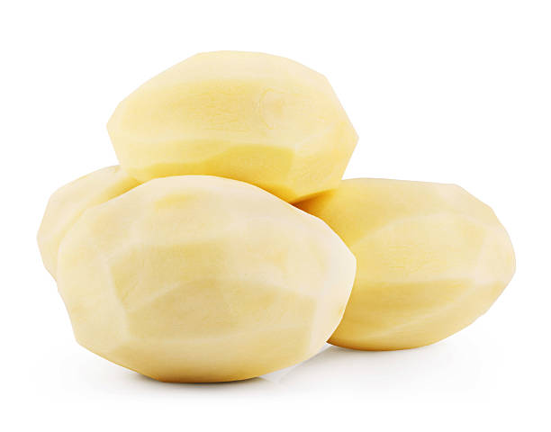 Raw peeled potatoes Raw peeled potatoes isolated on white background. Clipping Path peeled stock pictures, royalty-free photos & images