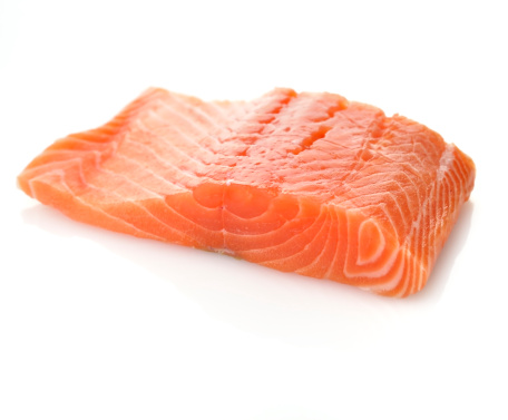 Raw Salmon Fillet On White Background , Close Up