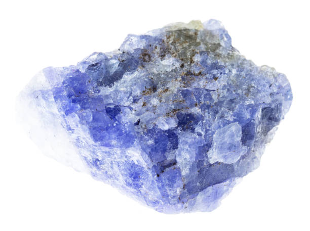 raw tanzanite stone on white macro photography of natural mineral from geological collection - raw tanzanite (blue and violet zoisite) stone on white background zoisite stock pictures, royalty-free photos & images