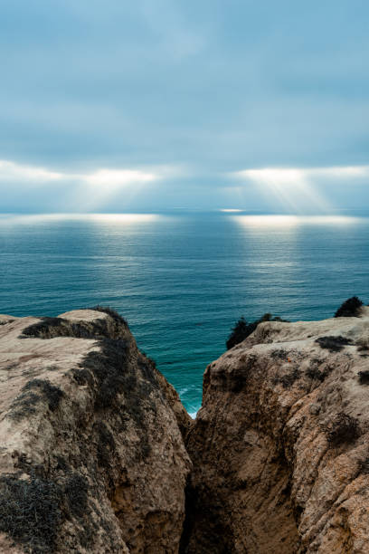 Rays of Light Over the Ocean from the Cliffs at Torrey Pines stock photo